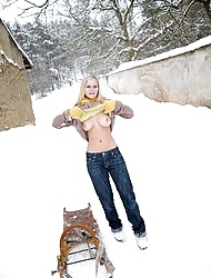 The snow makes her horny so they go inside to fuck hard